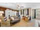 Cozy living area with a comfortable couch, tile floors, and abundant natural light at 4297 Regal Town Ln, Lake Mary, FL 32746