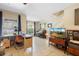 Bright living room with ample workspace, neutral tile, and a relaxing atmosphere at 4297 Regal Town Ln, Lake Mary, FL 32746