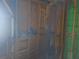Unfinished basement with wood beams and utilities at 4830 Kempston Dr, Orlando, FL 32812