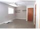 The bedroom has natural light from a window, a ceiling fan, and some shelving at 4830 Kempston Dr, Orlando, FL 32812