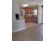 Bright kitchen features tile floor, wooden cabinets, and modern stainless steel appliances at 4830 Kempston Dr, Orlando, FL 32812
