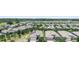 Aerial view of homes with solar panels in a well-maintained neighborhood at 518 Briarbrook Way, Deland, FL 32724