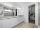 Bright bathroom boasts double sink vanity, granite counters, glass enclosed shower and a closet at 518 Briarbrook Way, Deland, FL 32724
