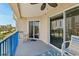 Relaxing balcony with seating, an ocean view, and beach views with sliding glass doors to the interior at 5300 S Atlantic Ave # 12-403, New Smyrna Beach, FL 32169