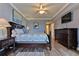 Cozy bedroom features a king bed, elegant decor, and ample natural light for a peaceful retreat at 5300 S Atlantic Ave # 12-403, New Smyrna Beach, FL 32169