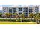 Beautiful condo with spacious balconies, lush landscaping, and ample parking at 5300 S Atlantic Ave # 12-403, New Smyrna Beach, FL 32169