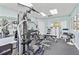 Well-equipped gym with modern weightlifting machines and natural light at 5300 S Atlantic Ave # 12-403, New Smyrna Beach, FL 32169