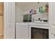 Laundry room featuring a white washer and dryer at 5300 S Atlantic Ave # 12-403, New Smyrna Beach, FL 32169