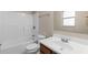 Bathroom features a shower-tub combo, toilet and sink at 541 Northwestern Ave, Altamonte Springs, FL 32714