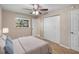 Cozy bedroom features neutral tones and a ceiling fan at 541 Northwestern Ave, Altamonte Springs, FL 32714