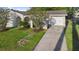 Charming single Gathering home boasting an attached garage, well-manicured lawn, and inviting curb appeal at 541 Northwestern Ave, Altamonte Springs, FL 32714