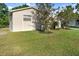 Inviting single-story home featuring a well-manicured lawn and appealing landscaping at 541 Northwestern Ave, Altamonte Springs, FL 32714