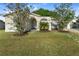 Charming single-story home with stucco exterior and lawn at 541 Northwestern Ave, Altamonte Springs, FL 32714
