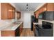 Functional kitchen with ample cabinets and granite counters at 541 Northwestern Ave, Altamonte Springs, FL 32714