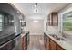 Bright kitchen with stainless steel appliances and granite counters at 541 Northwestern Ave, Altamonte Springs, FL 32714