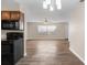 Open living room area with wood flooring and plenty of light at 541 Northwestern Ave, Altamonte Springs, FL 32714