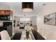 Elegant dining area with modern chandelier and open floor plan at 541 Northwestern Ave, Altamonte Springs, FL 32714
