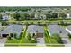 Aerial view of home with landscaped yard, showcasing property lines and surrounding neighborhood at 5513 Estero Loop, Port Orange, FL 32128