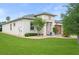 Charming single-story home with well-maintained lawn and inviting front entrance at 5513 Estero Loop, Port Orange, FL 32128