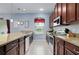 Well-appointed kitchen with granite counters, stainless appliances, and ample cabinet space at 5513 Estero Loop, Port Orange, FL 32128