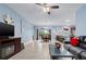 Spacious living area with seamless flow to the dining area, with plenty of natural light at 5513 Estero Loop, Port Orange, FL 32128