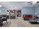 Open-concept living area with a spacious kitchen and breakfast bar, ideal for entertaining at 5513 Estero Loop, Port Orange, FL 32128