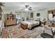 Bright bedroom with wood floors, closet, and plenty of storage at 5967 Plantera Ct, Port Orange, FL 32127