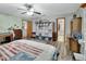 Spacious bedroom with adjacent bath, craft area, and natural light at 5967 Plantera Ct, Port Orange, FL 32127