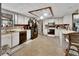 Functional kitchen with white cabinets, black appliances, and ample counter space at 5967 Plantera Ct, Port Orange, FL 32127