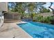 Backyard pool and patio providing a refreshing and relaxing outdoor oasis for entertaining at 5967 Plantera Ct, Port Orange, FL 32127