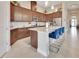 Gourmet kitchen with granite countertops, stainless steel appliances, and a large island at 6254 Woodhaven Village Dr, Port Orange, FL 32128
