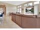 Open floor plan featuring the living room area with a view to the dining room at 6254 Woodhaven Village Dr, Port Orange, FL 32128