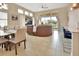 Bright and spacious living area with views of the dining area and backyard at 6254 Woodhaven Village Dr, Port Orange, FL 32128
