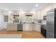 Eat-in kitchen with stainless steel appliances, and countertops at 701 N Tuxedo Ave, Deland, FL 32724