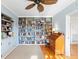 Office featuring hardwood floors, and built-in book shelves at 701 N Tuxedo Ave, Deland, FL 32724