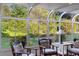 Bright sunroom with large windows offering scenic views and comfortable seating, perfect for relaxation at 701 N Tuxedo Ave, Deland, FL 32724