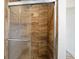 Elegant bathroom featuring a tiled shower with glass doors and a modern showerhead at 718 Sleepy Hollow Dr, Port Orange, FL 32127