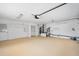 Expansive garage space including a utility area, with room for storage or a workshop at 718 Sleepy Hollow Dr, Port Orange, FL 32127