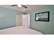 Bedroom featuring a closet and a mirror at 8 Ocean Dunes Dr, Ormond Beach, FL 32176
