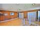 Upper hallway with hardwood floors, showing multiple closets and access to other areas of the home at 8 Ocean Dunes Dr, Ormond Beach, FL 32176