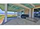 Outdoor covered patio features a built-in grill and gorgeous ocean views at 8 Ocean Dunes Dr, Ormond Beach, FL 32176