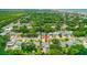 Aerial view of neighborhood showing proximity to the beach, with home marked by an arrow at 809 E 14Th Ave, New Smyrna Beach, FL 32169