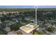 A beautiful aerial view showcasing the property, surrounding neighborhood, and distant waterfront at 825 Wells Dr, South Daytona, FL 32119