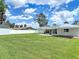 A well-maintained lawn and fence make this back yard perfect for entertainment and relaxation at 832 Wildwood Cir, Port Orange, FL 32127