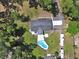 Overhead view of home featuring a refreshing pool and RV parking at 851 W Wisconsin Ave, Orange City, FL 32763