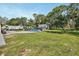 This backyard features a fenced pool and storage shed, plus ample green space at 851 W Wisconsin Ave, Orange City, FL 32763