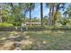 Inviting home with a decorative fence adding character and curb appeal to the property at 851 W Wisconsin Ave, Orange City, FL 32763