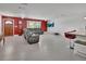 Expansive living area with modern decor and a stylish granite-topped bar at 851 W Wisconsin Ave, Orange City, FL 32763