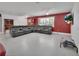 Spacious living room featuring recessed lighting and a large sectional sofa at 851 W Wisconsin Ave, Orange City, FL 32763