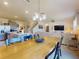 Bright dining area open to the kitchen and living room offers an expansive space for Gathering gatherings and dining at 918 Noble Run, New Smyrna Beach, FL 32168